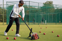 Ova NetCollect Ball Collector in Use on Cricket Training Ground With Bowling Machine Balls